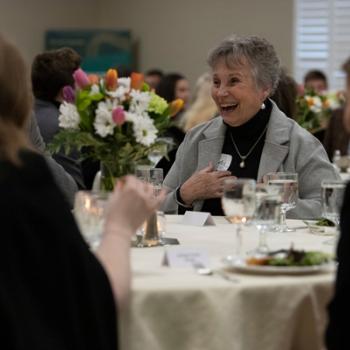 Business Executive Advisory Board meeting, woman at table