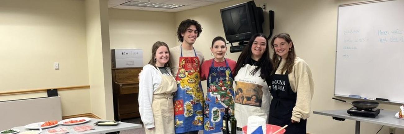 Dr. Morrison teaches the Italian Club how to make the central Italian dish, “torta al testo” at a cooking lesson in November.
