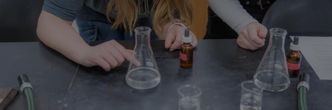 Ohio University Chemistry students in the lab with beakers 