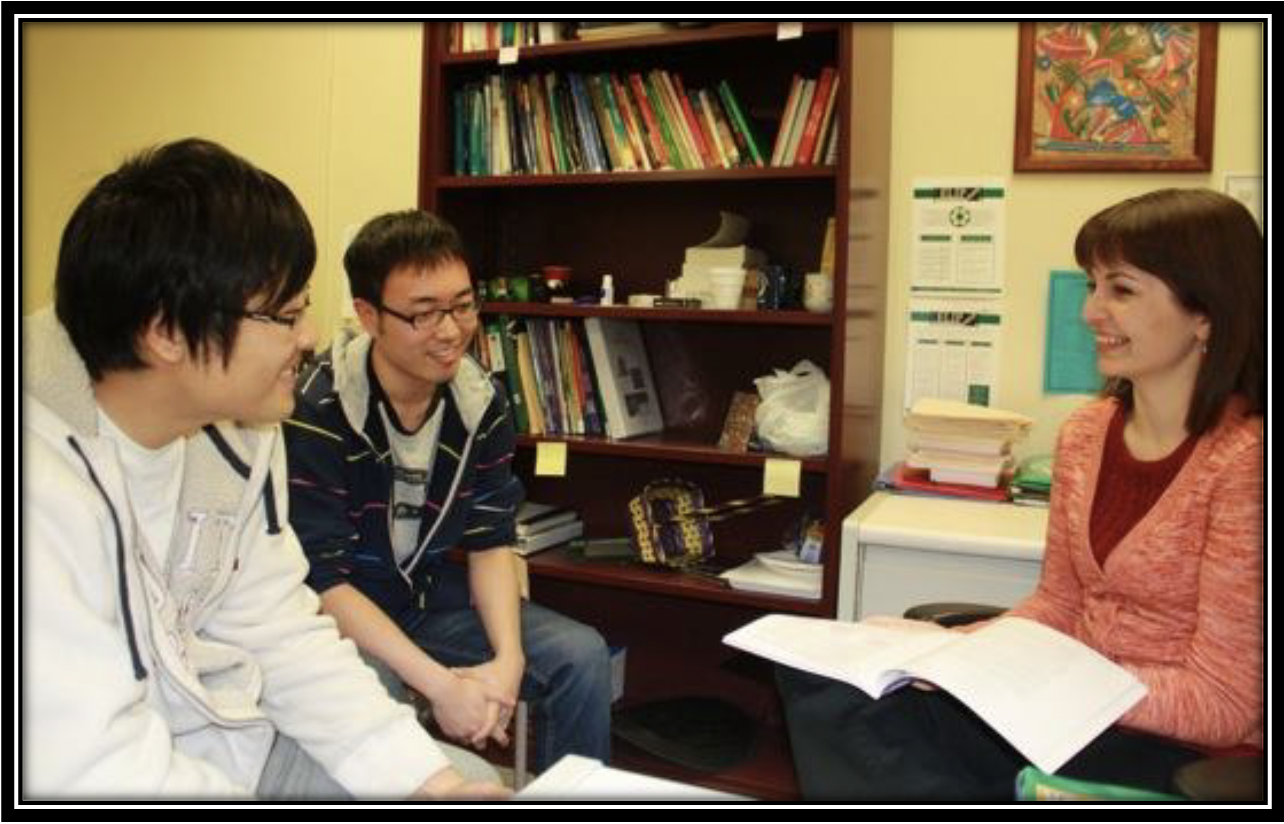 Two international students talking with an OPIE Advisor