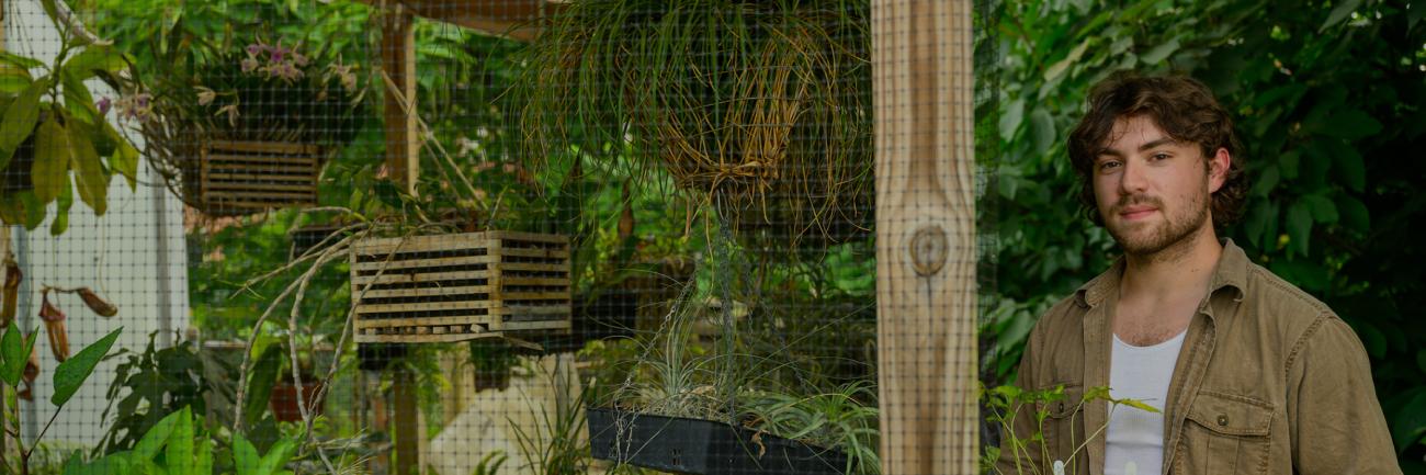 Thacker Ballard in the Ohio University Greenhouse