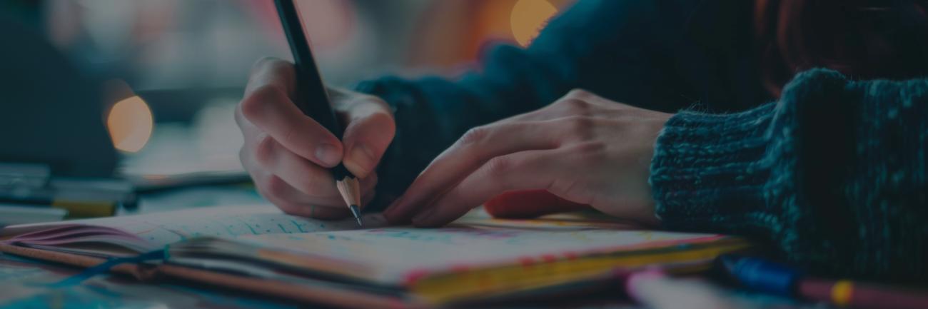 A student, a book and a pen