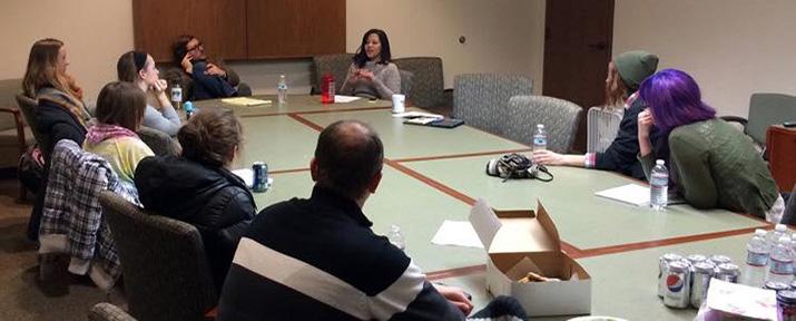 Faculty discussing organization events 