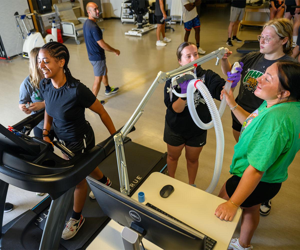 Exercise Physiology students practice conducting tests with one another.