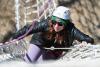 Student climbing on the Ohio University High Ropes Course.