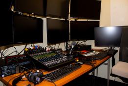 Webcasting Studio with multiple monitors and recording equipment