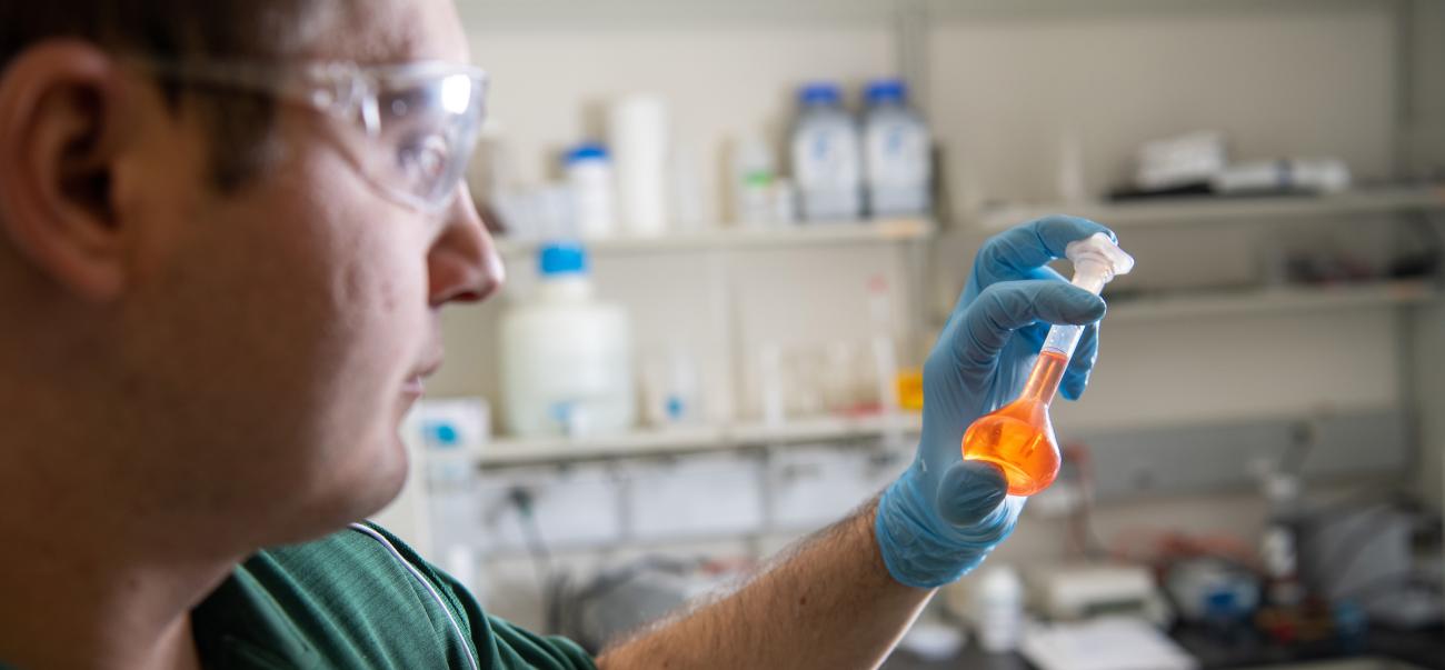 student assessing a chemical hero