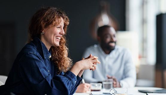 Project managers in a team meeting