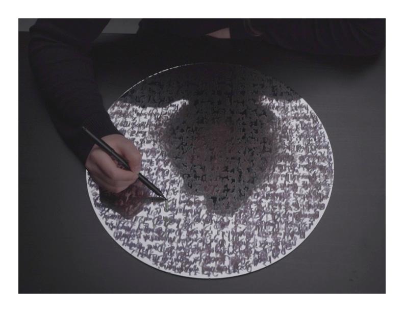 Person writing on a mirror