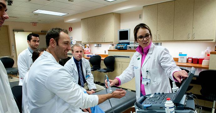 Preceptor working wiht medical students