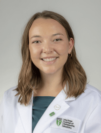 head shot of student in their white coat
