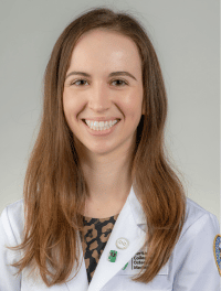 head shot of student in their white coat