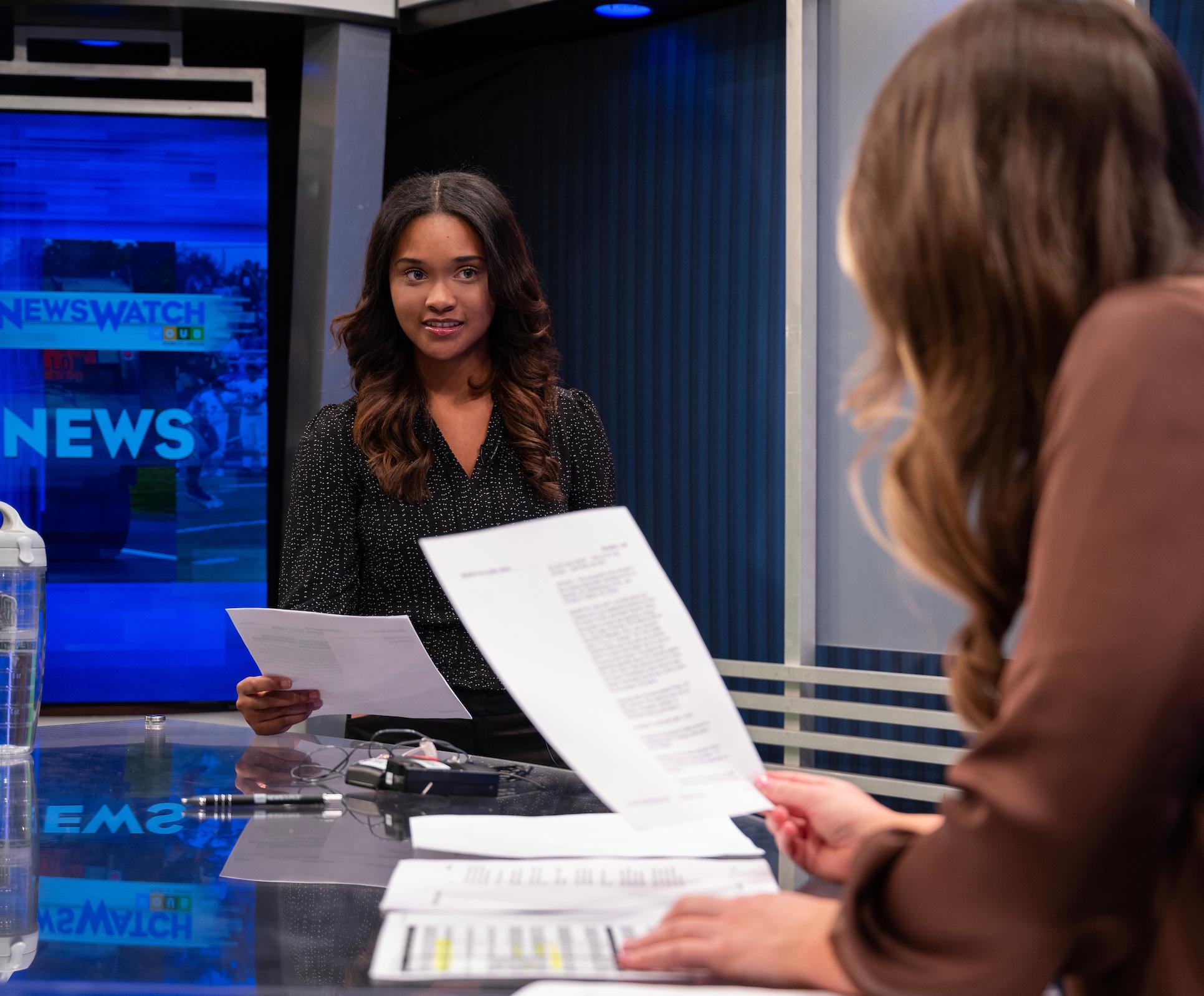 Students report the news at WOUB studios