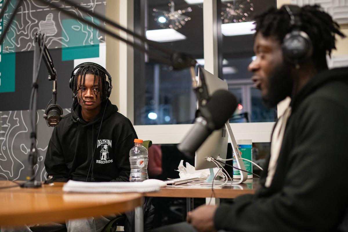 Students record a podcast together in Ohio University's podcast studio