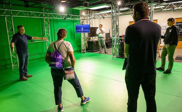 Faculty teaching a class in the motion capture facility at the GRID Lab