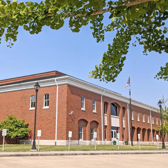 A long brick building with white trim.