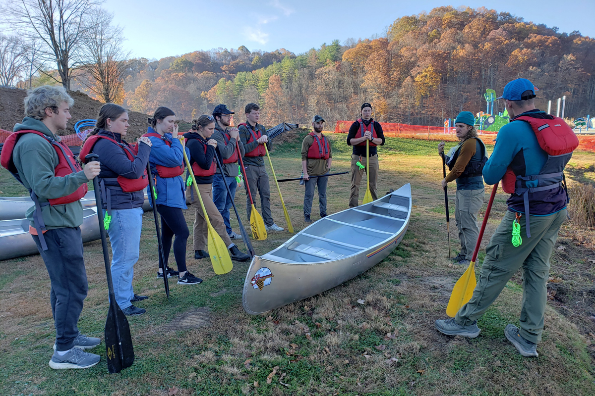 Robe Institute of Leadership Seminar students prepare for a canoe trip.