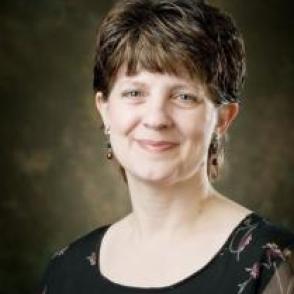 Dr. Kamile Geist
