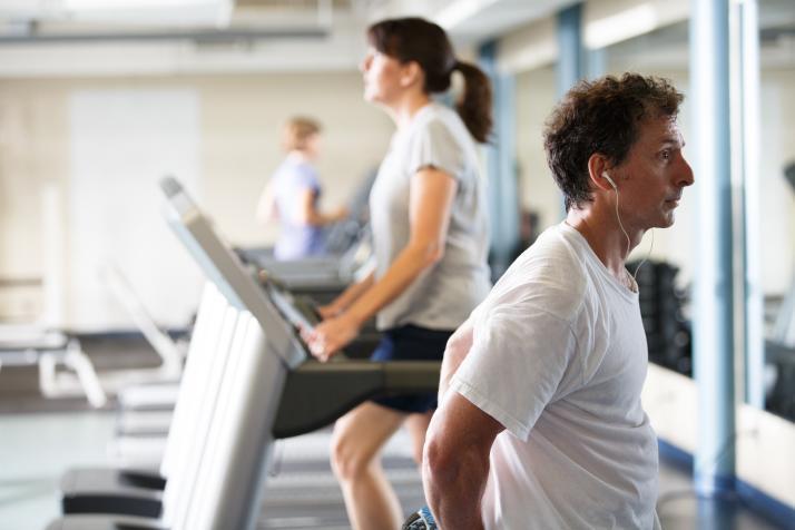 Man and Woman exercising at WellWorks