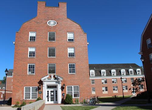 the main entrance to Ryors Hall on a blue sky day