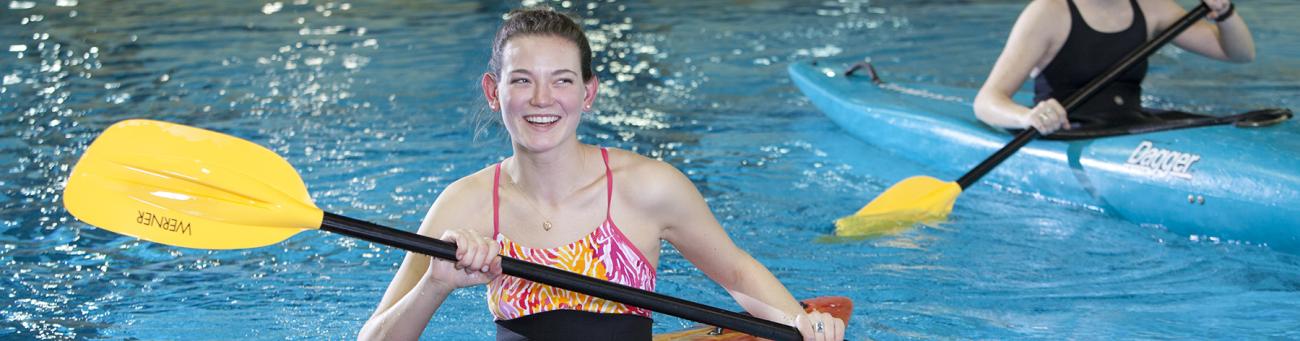 Students kayaking in pool