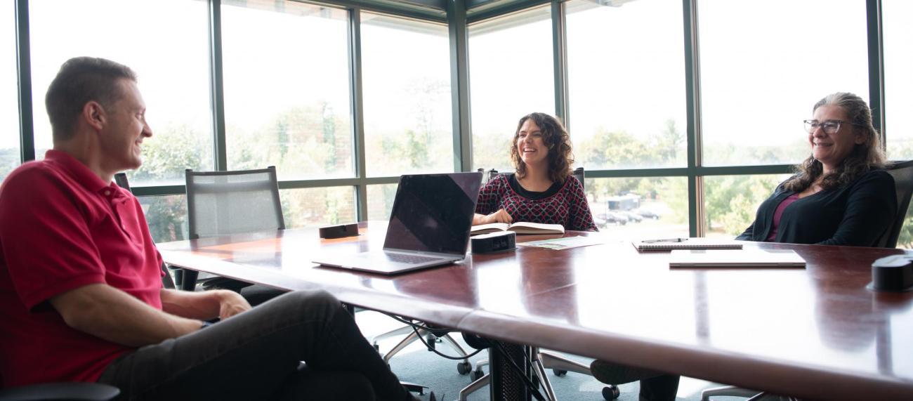 Coaches work with startup company on strategy