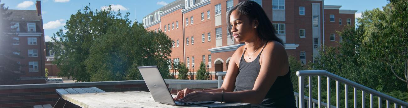 Student studying on laptop
