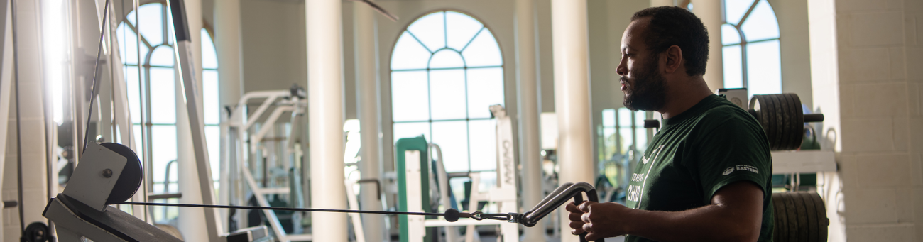 a man uses an exercise machine