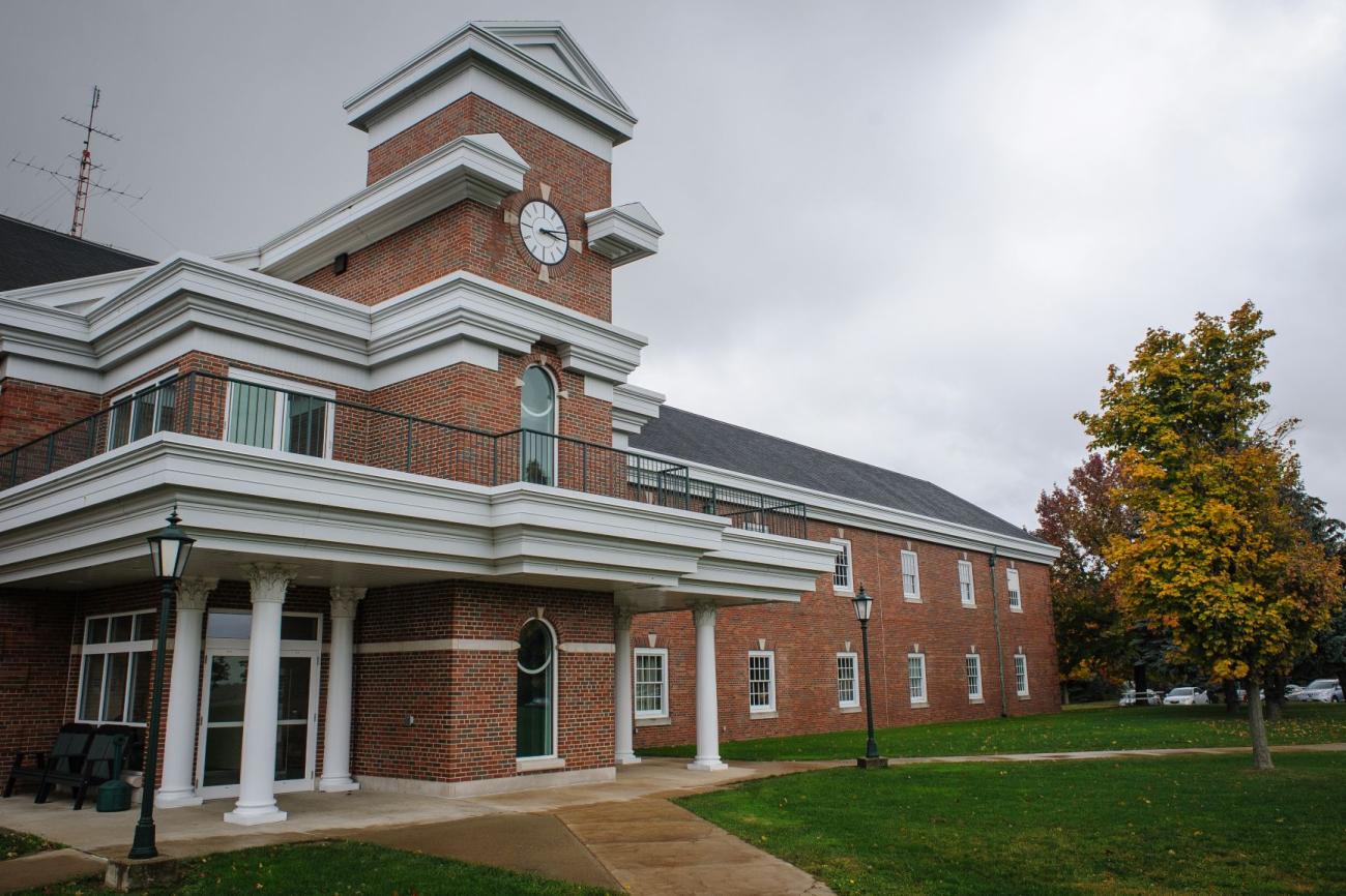 Shannon Hall, large brick building with white collumns