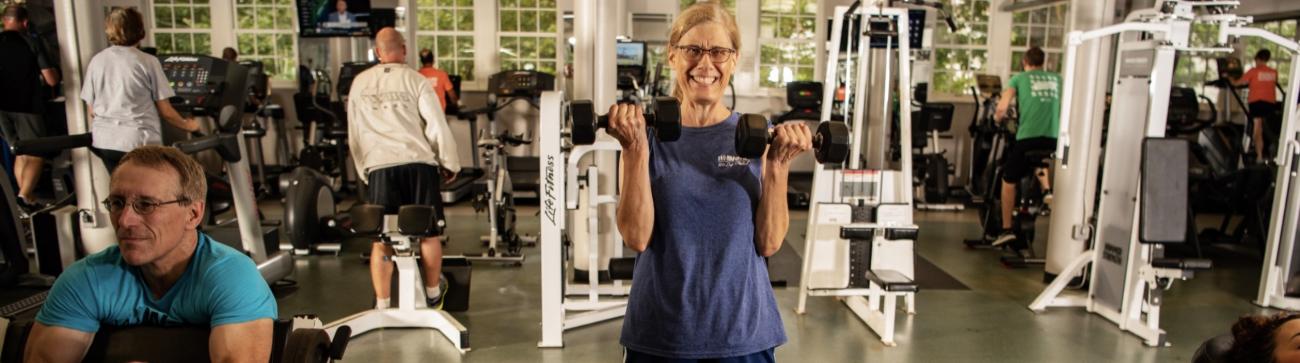 Members using WellWorks fitness center machines