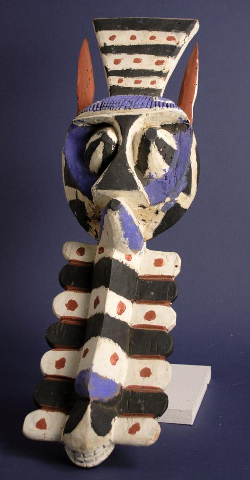 Unattributed Mask,  20th c.,  Nigeria,  wood, pigment,  24.5 x 8 x 4in ( 62.2 x 20.3 x 10.2cm),  68.025.F1.