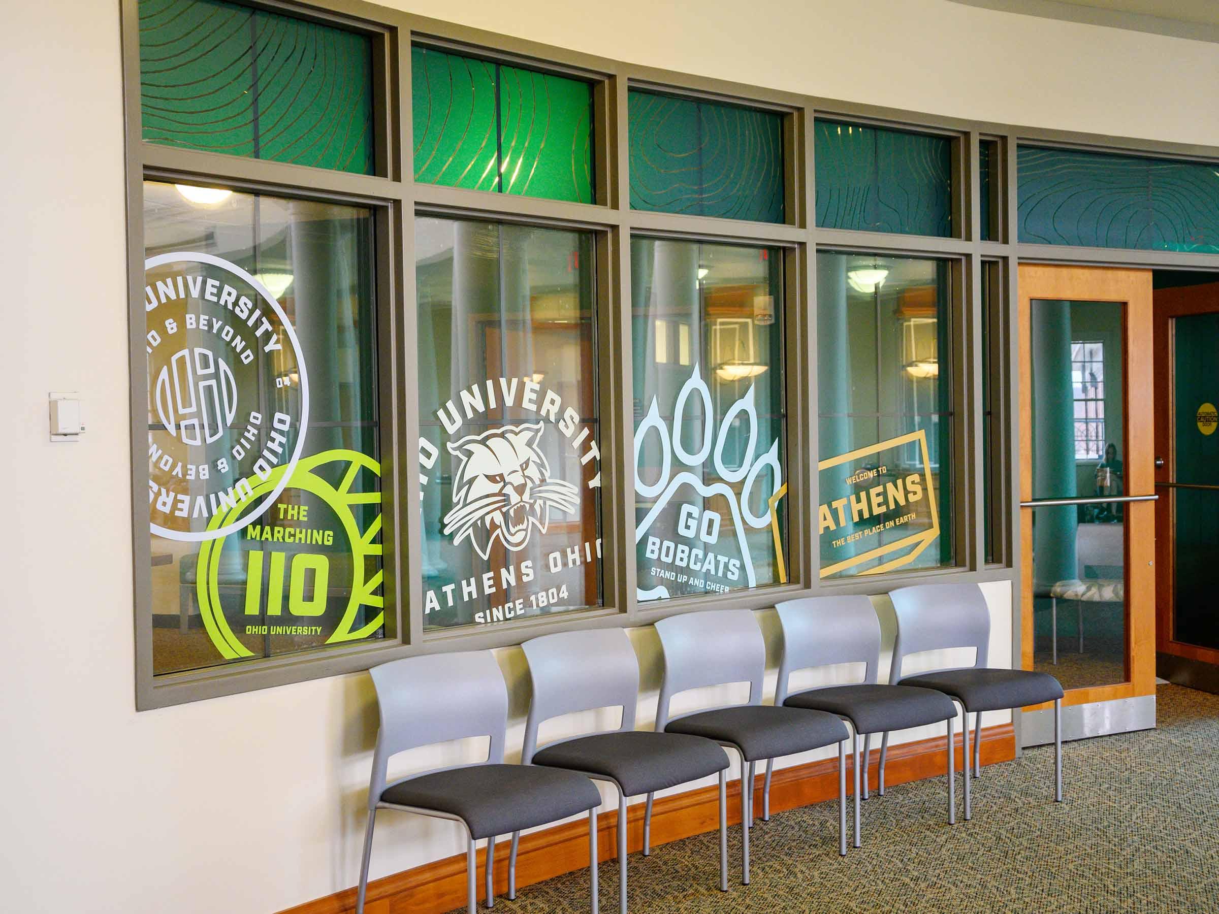Window decals applied in Baker to promote Forever OHIO branding