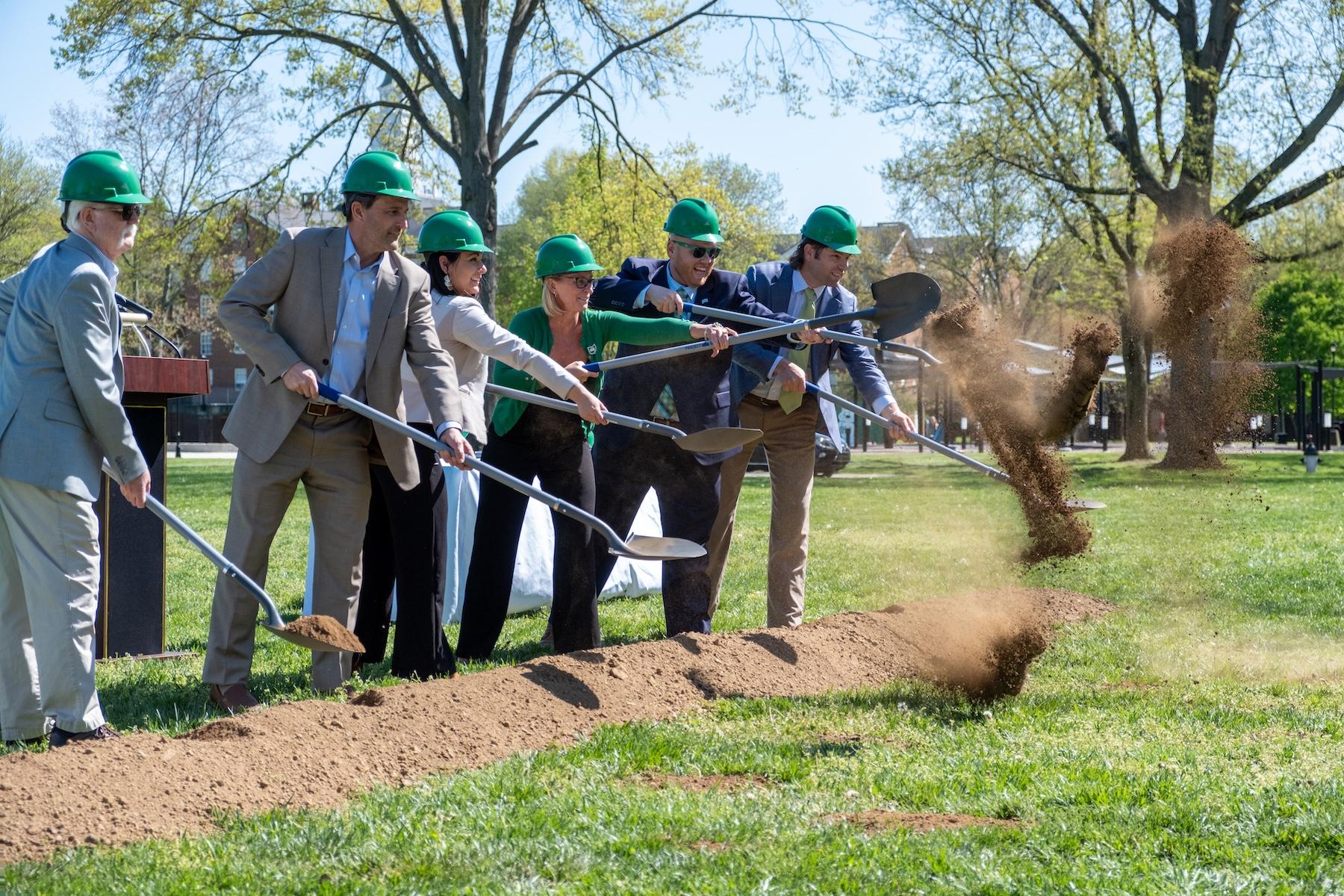 construction company shoveling ceremonial dirt