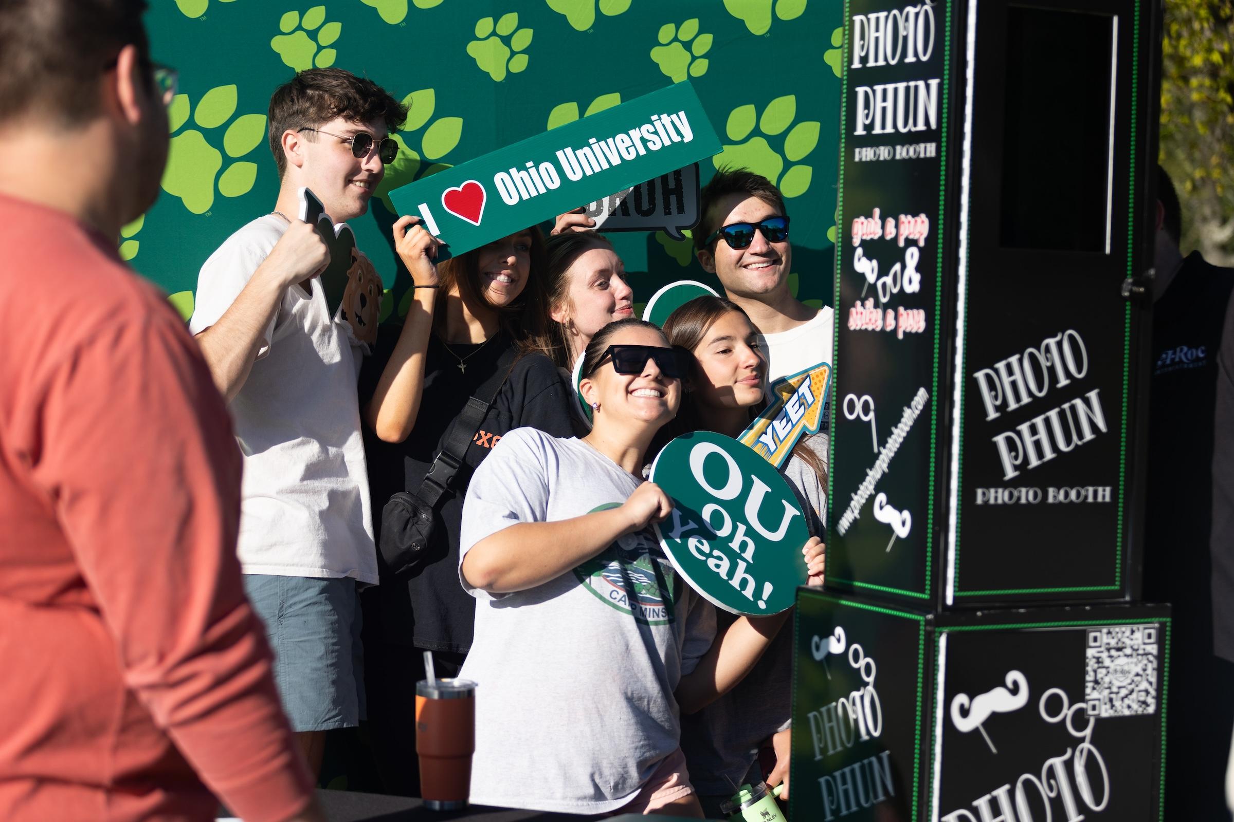 students using the photo booth at the event
