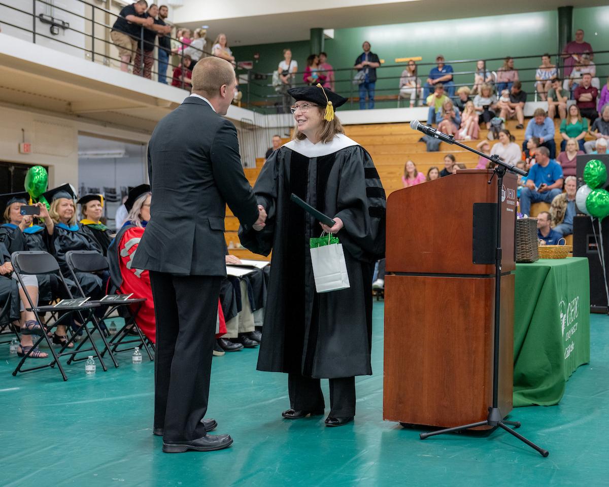 Joshua Walter receives an alumni award