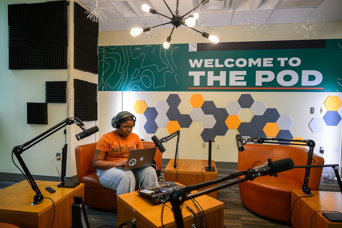 Student records themself in Ohio University's Podcast Studio