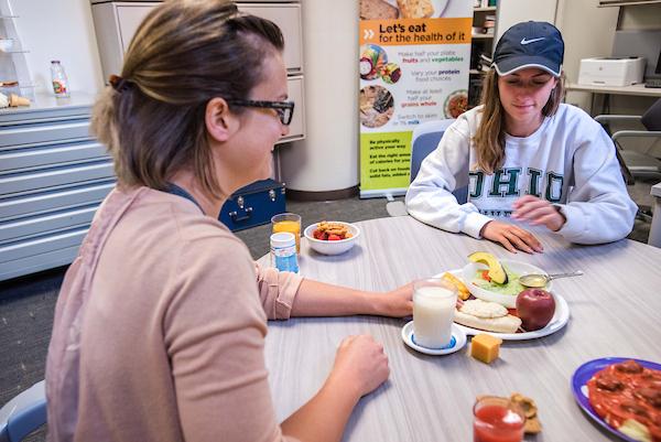 nutritional counseling with two people and healthy food