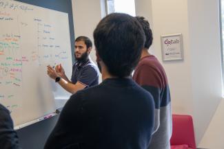 People at a white board