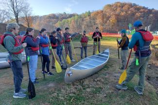 Robe Institute of Leadership Seminar students prepare for a canoe trip.