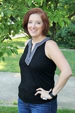 Portrait of Keely Davin looking at camera. 