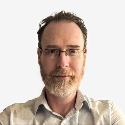 A headshot of Andy Ray