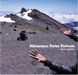 Hands outstretched to snow covered mountain.