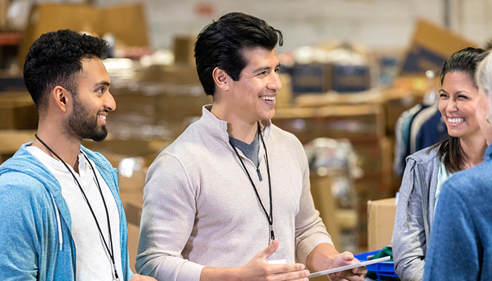 NonProfit Manager organizing aid distribution with team members
